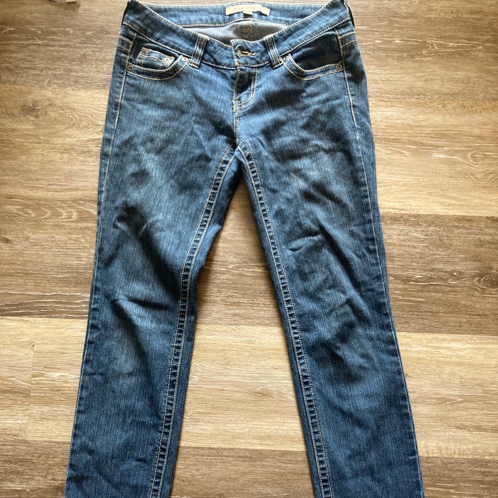 Forever 21 low-rise medium to dark wash jeans (size 26)